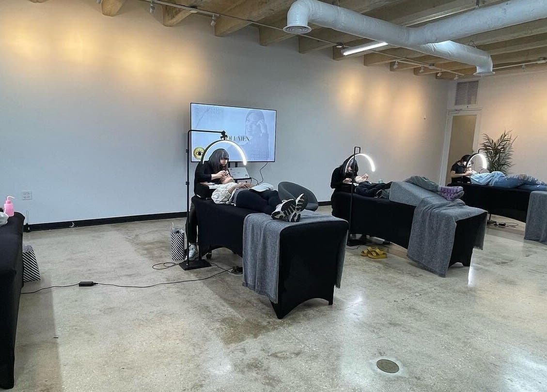 Interior of Millie Román Studio, San Juan, PR, showing clients relaxing during lash treatments.