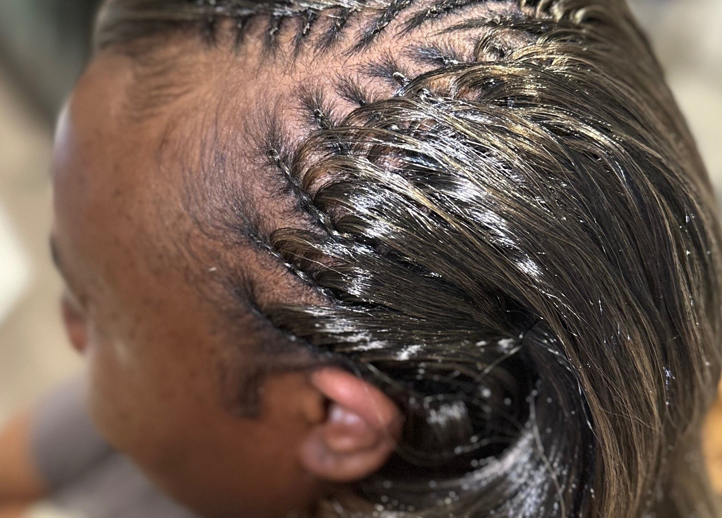 Intricately braided hairstyle at Cheveux By Cindy in Bexleyheath, England, GB, showcasing expert styling.