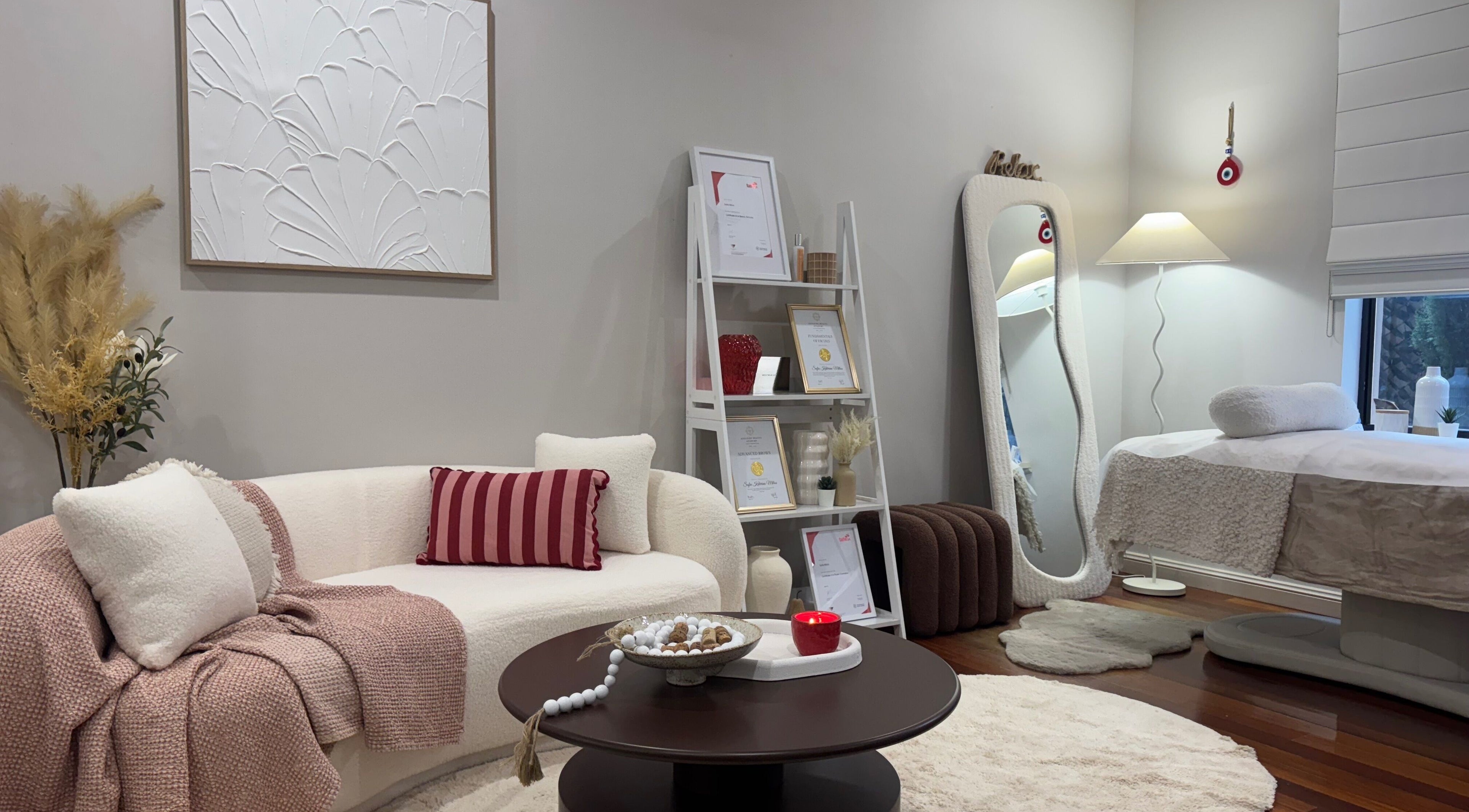 Elegant interior of Beauty By Sofia Katerina, Magill, South Australia, AU showcasing spa bed and comfy seating.