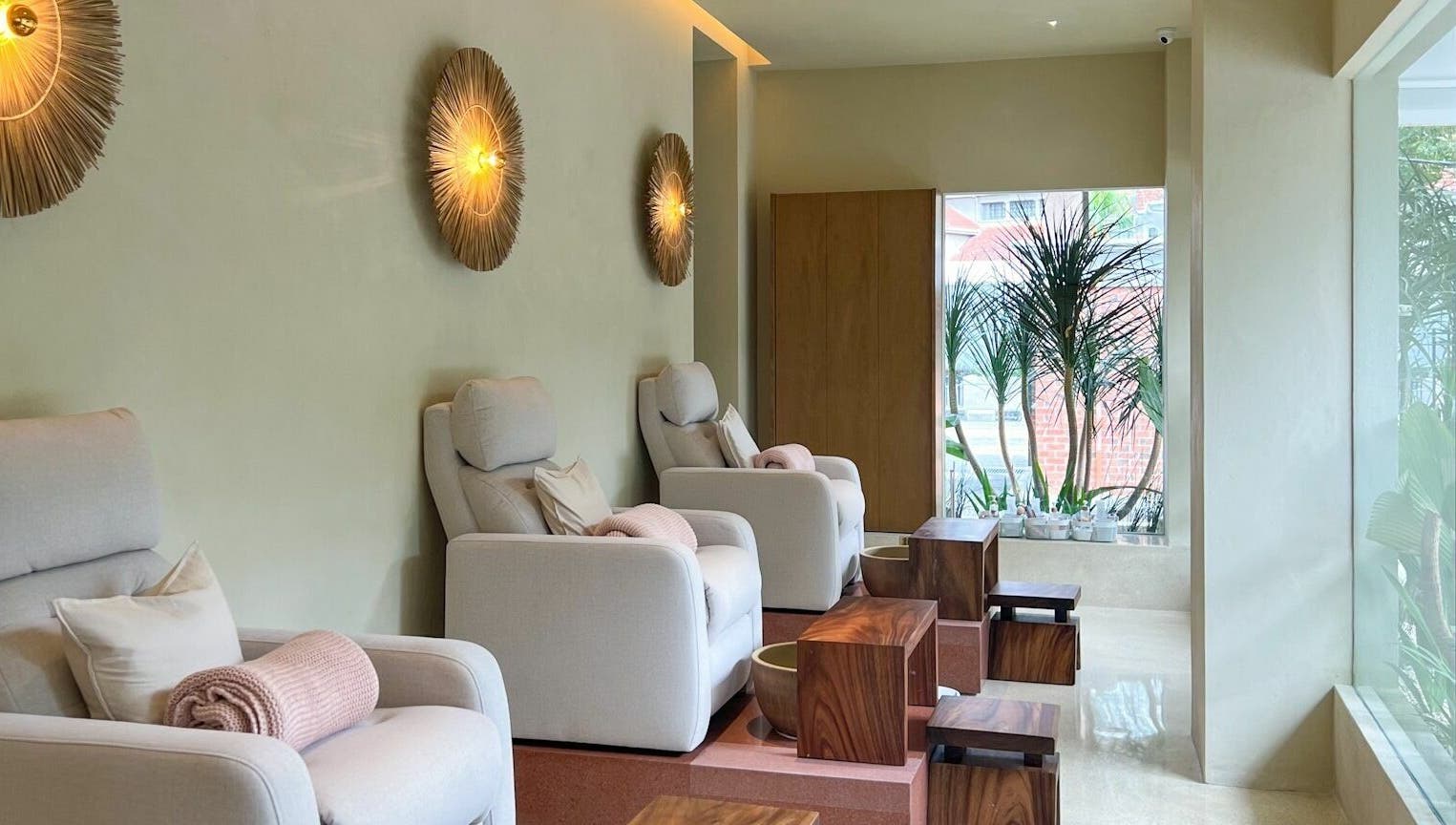 Relax in plush chairs at LYLA Beauty Lounge, Kuala Lumpur, Wilayah Persekutuan Kuala Lumpur, MY with lush decor.