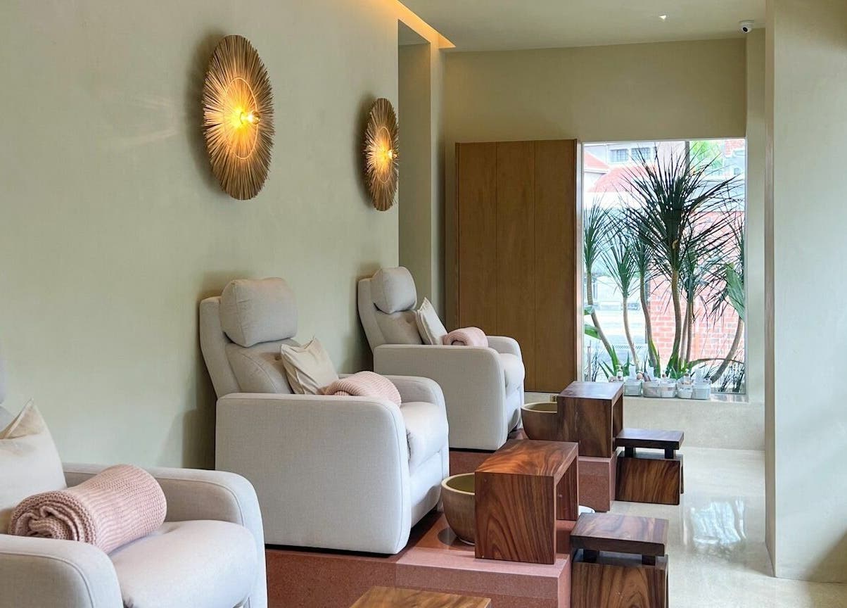 Relax in plush chairs at LYLA Beauty Lounge, Kuala Lumpur, Wilayah Persekutuan Kuala Lumpur, MY with lush decor.