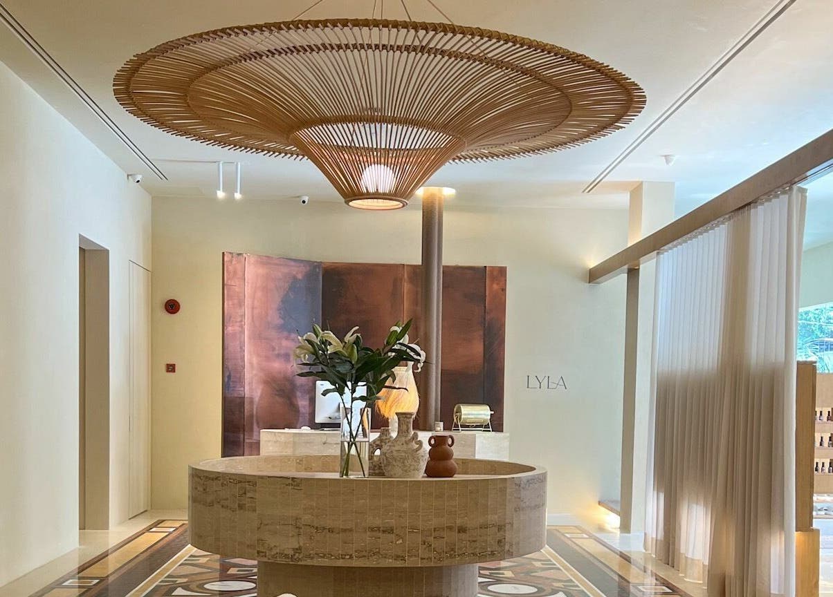 Elegant interior of LYLA Beauty Lounge in Kuala Lumpur, showcasing a stylish reception area with modern decor.