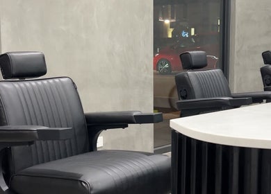 Modern black salon chairs at Studio P, Melbourne, Victoria, AU creating a sleek, stylish atmosphere.