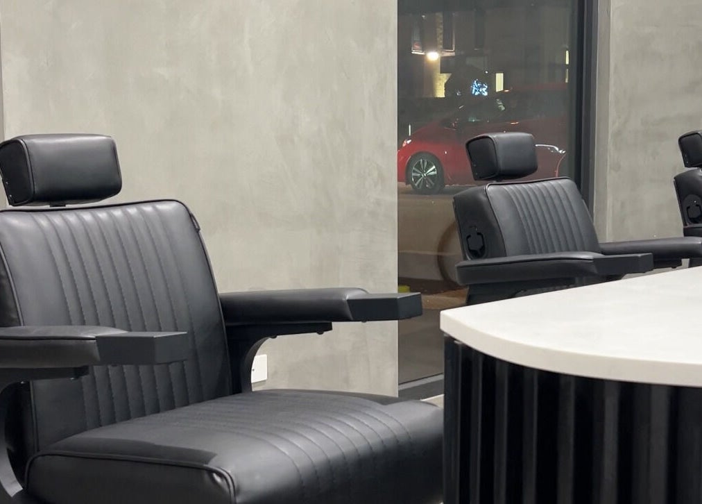 Modern black salon chairs at Studio P, Melbourne, Victoria, AU creating a sleek, stylish atmosphere.