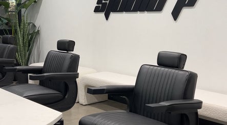 Elegant black salon chairs at Studio P, Melbourne, Victoria, AU offering a modern beauty experience.