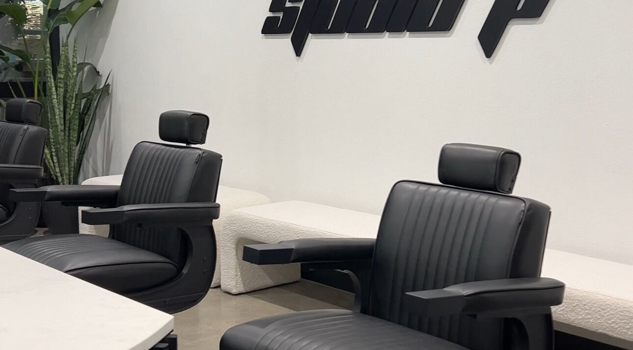 Elegant black salon chairs at Studio P, Melbourne, Victoria, AU offering a modern beauty experience.