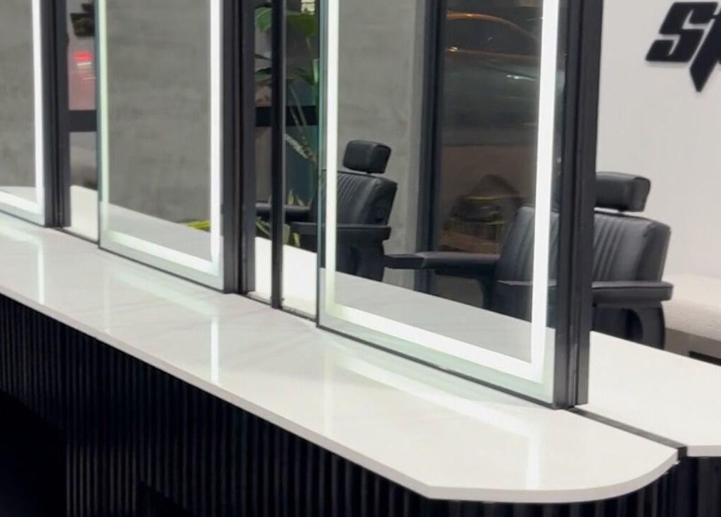 Sophisticated vanity mirrors at Studio P, Melbourne, Victoria, AU creating a chic and inviting salon ambiance.