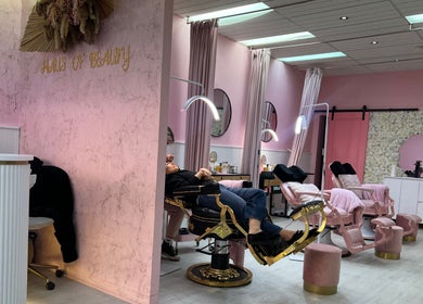 Elegant beauty salon interior at Haus of Beauty, Waverley, New South Wales, AU with pink decor and floral accents.