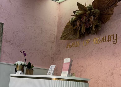Reception at Haus of Beauty in Waverley, New South Wales, AU with elegant décor and floral accents.