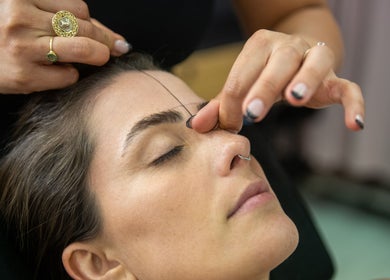 Eyebrow threading at Haus of Beauty in Waverley, New South Wales, AU with a focus on precision and care.
