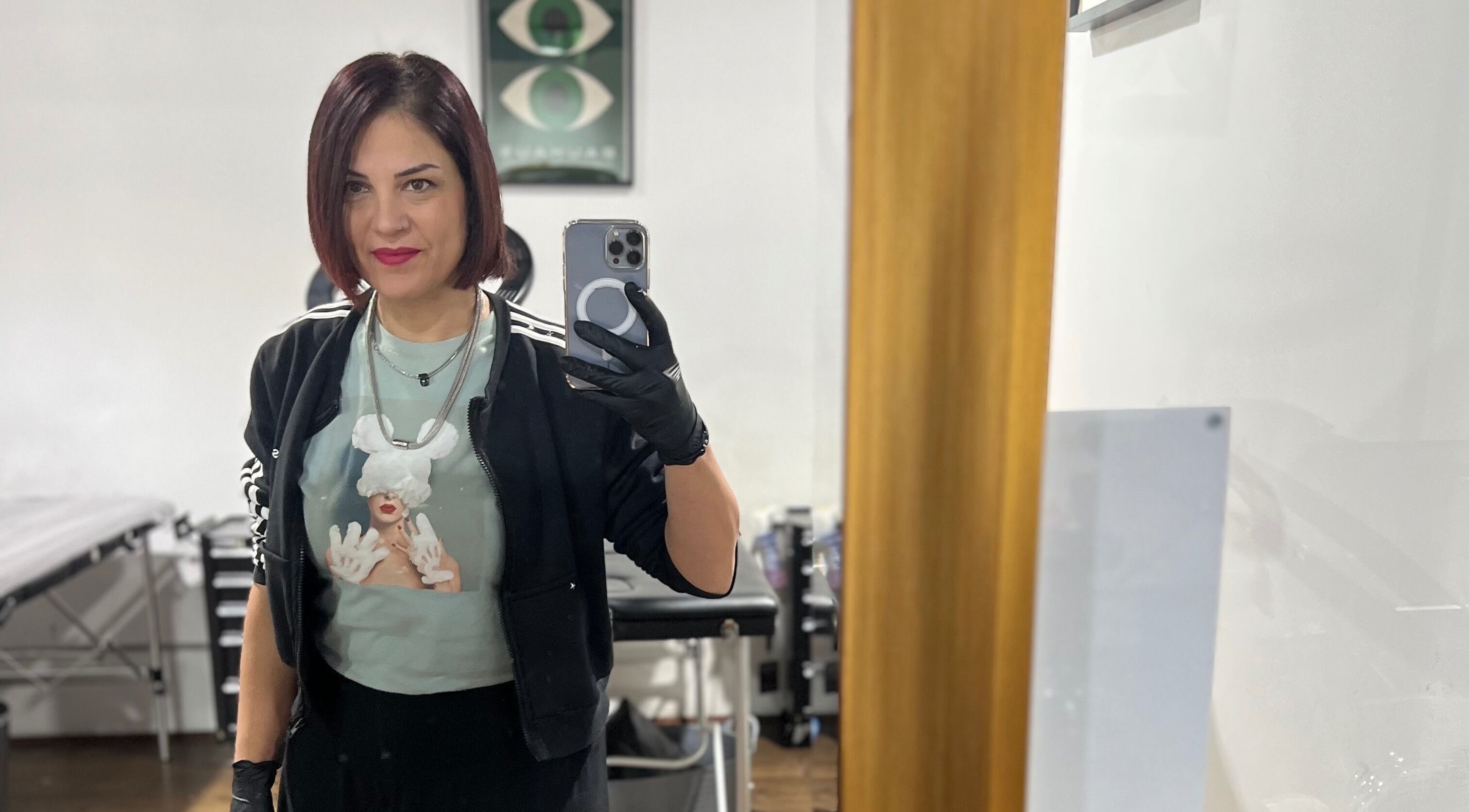 Viviana Sp Tattoo Artist at Melbourne, Victoria, AU in her studio, capturing a selfie.