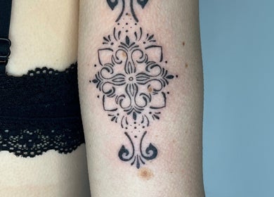 Elegant ornamental tattoo by Viviana Sp Tattoo Artist, Melbourne, Victoria, AU on a client's arm.