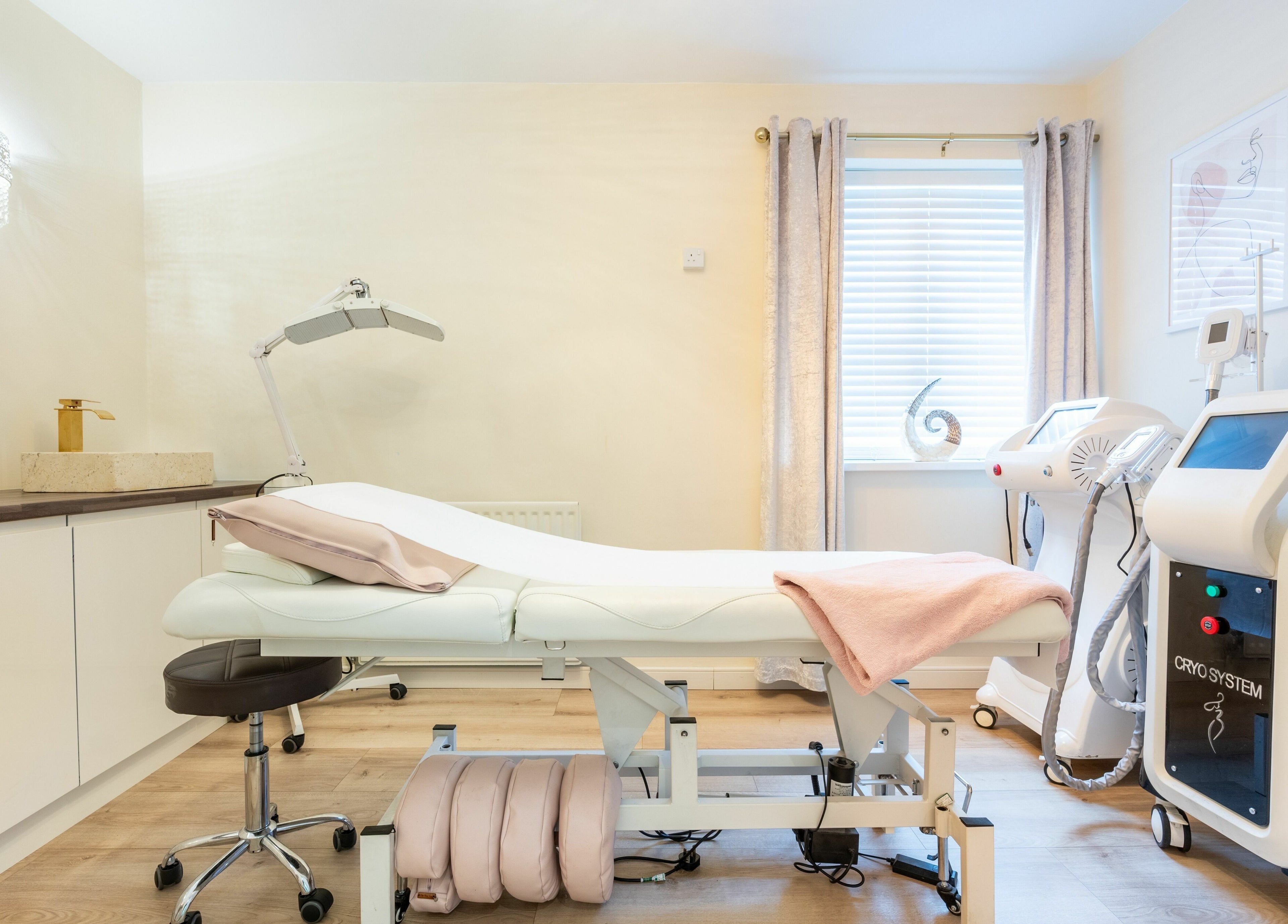 Elegant treatment room at Body Perfection in Willenhall, England, GB, featuring advanced wellness equipment.