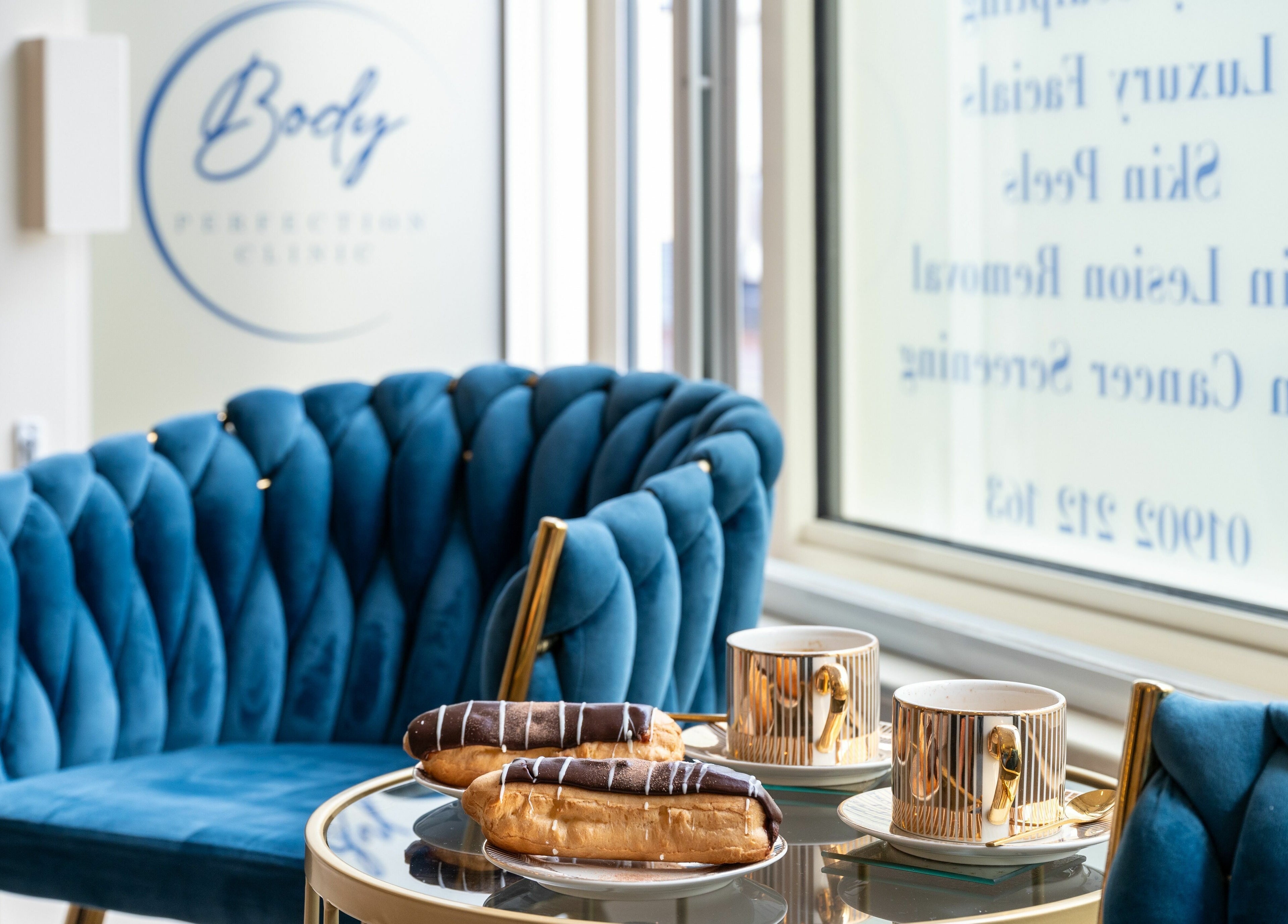 Luxurious seating and treats at Body Perfection, Willenhall, England, GB, offering a serene ambiance.