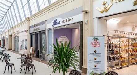 Exterior of Allure Nail Bar at Mississauga, Ontario, CA inside a modern mall.