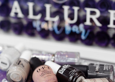 Nail polishes at Allure Nail Bar, Mississauga, Ontario, CA showcasing premium manicure options.