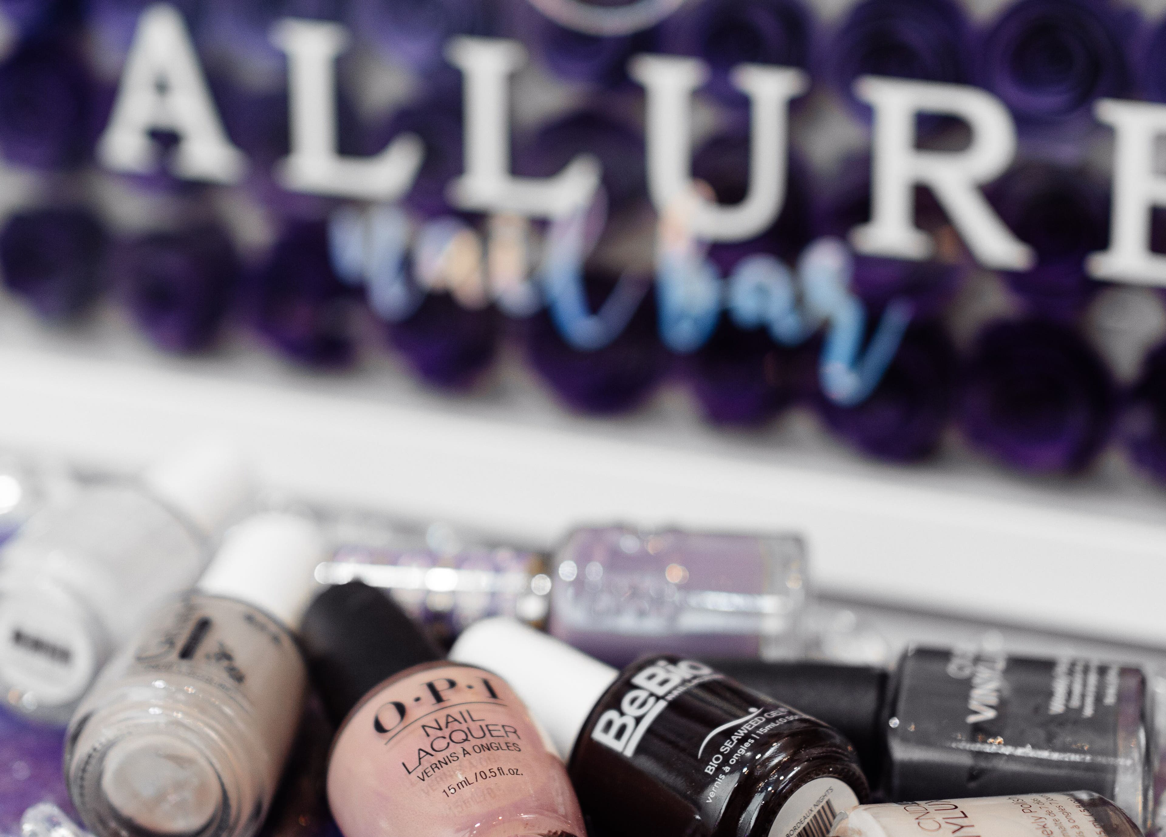 Nail polishes at Allure Nail Bar, Mississauga, Ontario, CA showcasing premium manicure options.