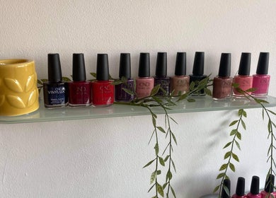 Nail polishes on a shelf at Gardenia Beauty Mobile Treatments, Blackpool, England, GB.