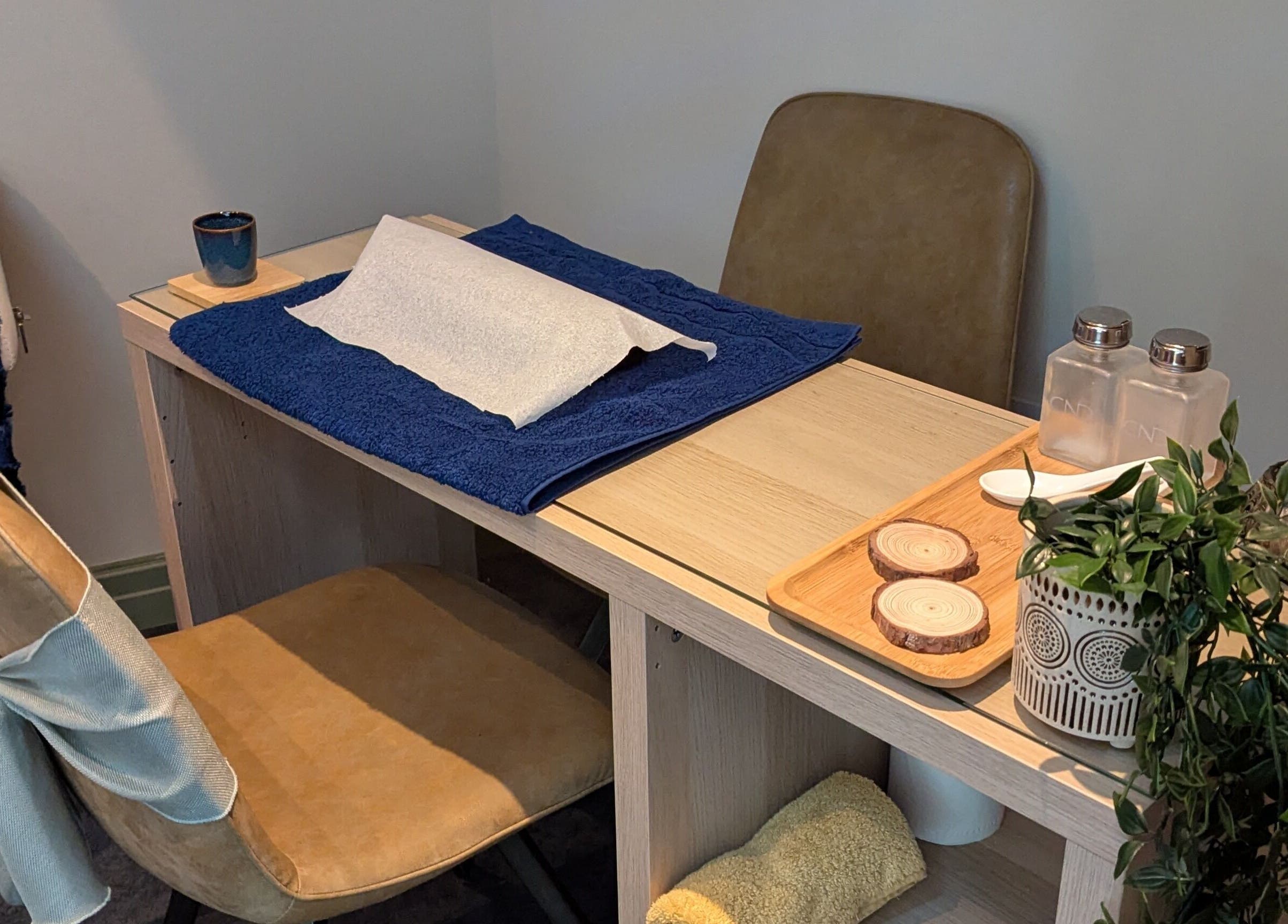 Modern manicure station at Gardenia Beauty at Lakeside, Hambleton, England, GB with cozy seating.