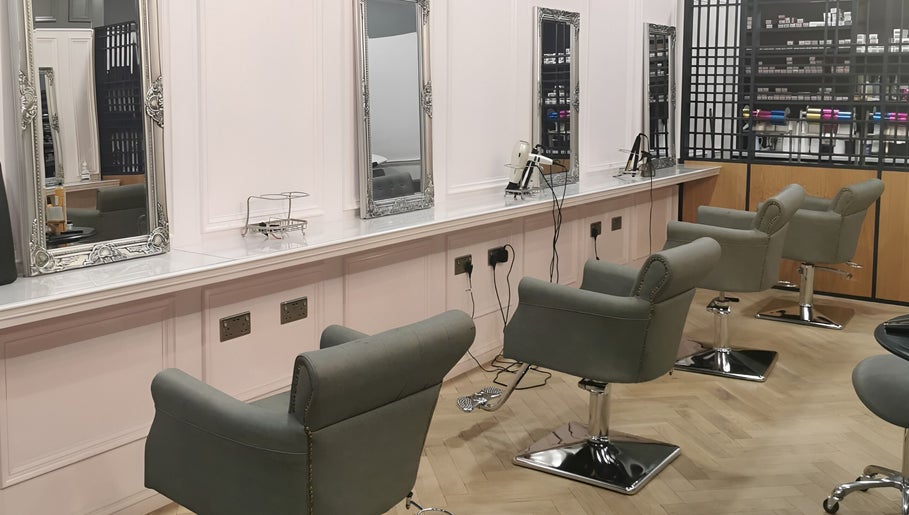 Chic salon chairs and mirrors at FAB Facial Aesthetics & Beauty, Dunstable, England, GB.