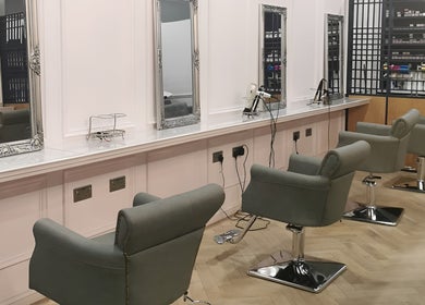 Chic salon chairs and mirrors at FAB Facial Aesthetics & Beauty, Dunstable, England, GB.