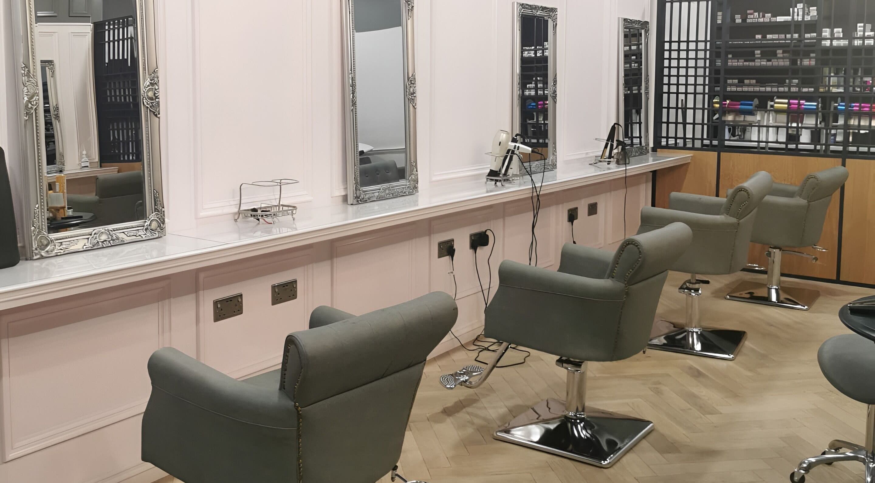 Chic salon chairs and mirrors at FAB Facial Aesthetics & Beauty, Dunstable, England, GB.