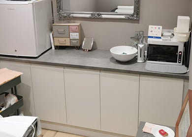 Modern treatment room at FAB Facial Aesthetics & Beauty, Dunstable, England, GB, showcasing equipment and decor.