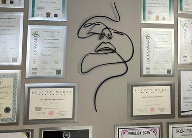 Certifications wall at FAB Facial Aesthetics & Beauty in Dunstable, England, GB highlighting expertise.