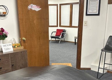 Inviting interior of Pristine Lash & Beauty Lounge in Idaho Falls, Idaho, US, featuring a cozy welcome sign.