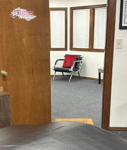 Inviting interior of Pristine Lash & Beauty Lounge in Idaho Falls, Idaho, US, featuring a cozy welcome sign.