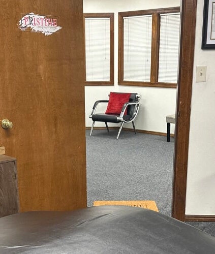 Inviting interior of Pristine Lash & Beauty Lounge in Idaho Falls, Idaho, US, featuring a cozy welcome sign.