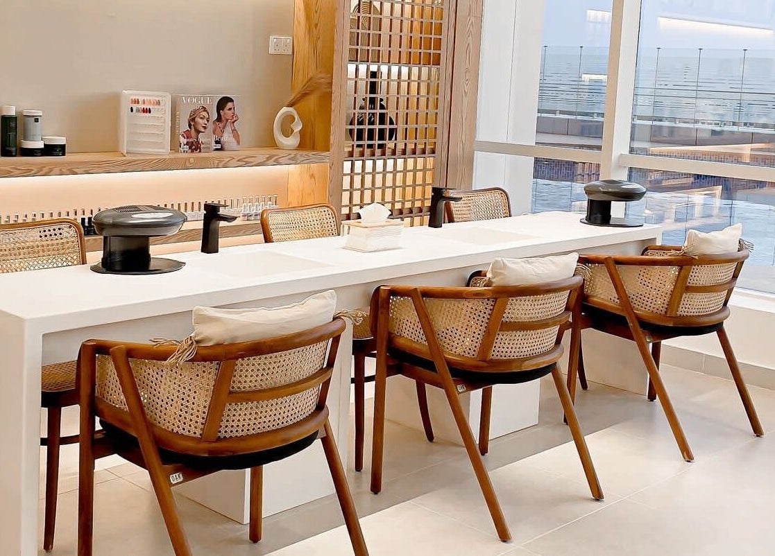 Chic nail salon at Tiara The Spa, الخبر, المنطقة الشرقية, SA. Modern chairs and bright ambiance.