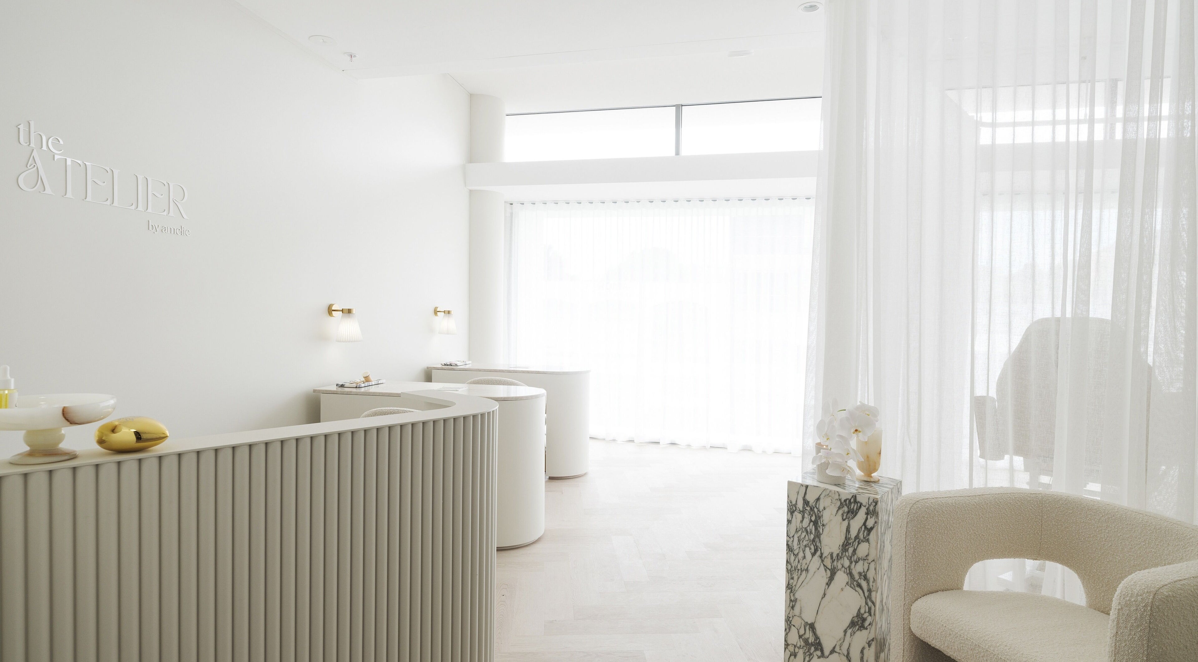 Bright, modern reception at The Atelier Double Bay, Double Bay, New South Wales, AU with chic decor and soft lighting.