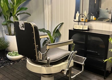 Vintage barber chair at Grand Royal Barbers - Darlinghurst, Sydney, New South Wales, AU.