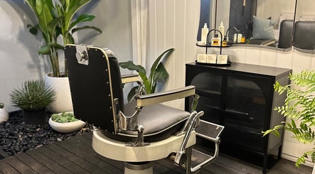Vintage barber chair at Grand Royal Barbers - Darlinghurst, Sydney, New South Wales, AU.