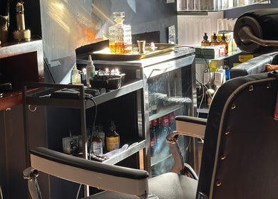 Luxury barbershop chair and grooming tools at Grand Royal Barbers - Darlinghurst, Sydney, New South Wales, AU.