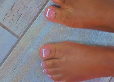 Elegant French pedicure at Star Glam Nails in Sandton, Gauteng, ZA showcasing perfect nail artistry.