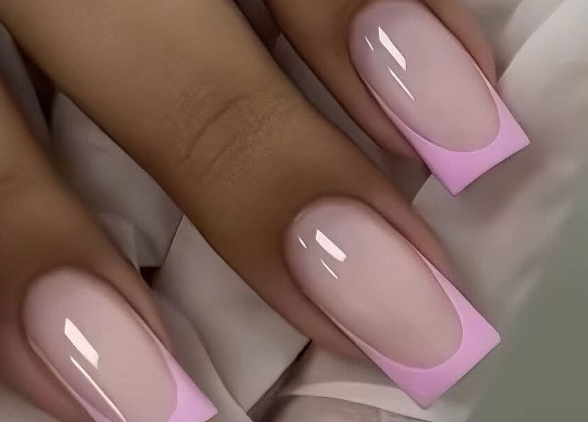 Elegant pink-tipped manicure at Star Glam Nails in Sandton, Gauteng, ZA showcasing stylish nail art.