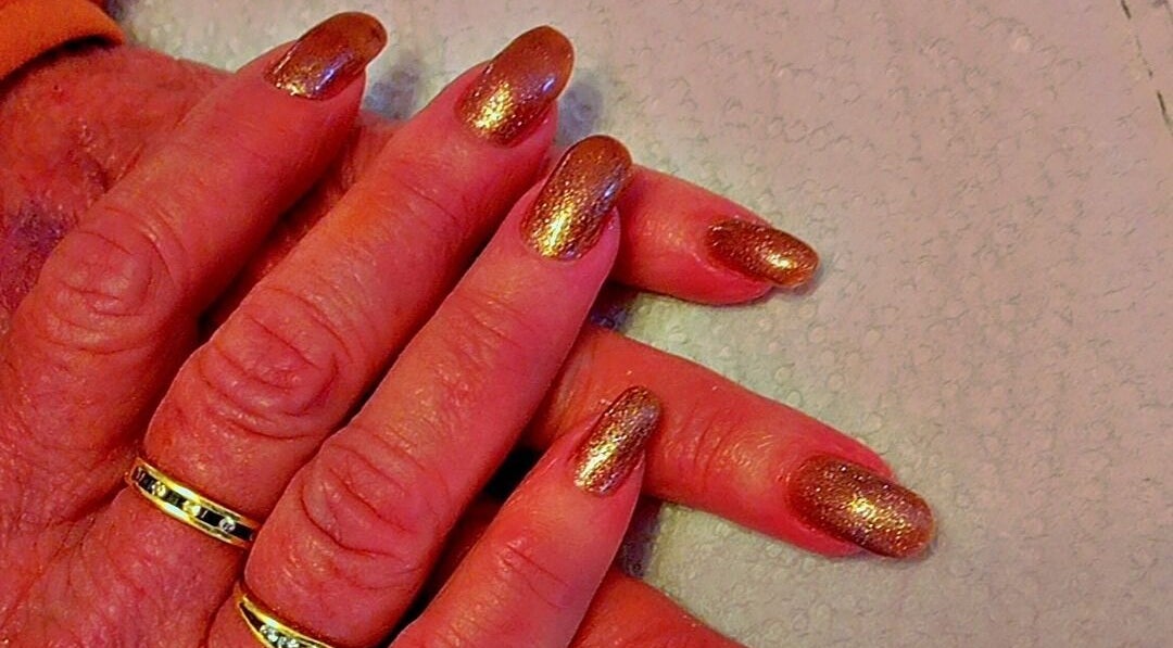 Elegant gold nails at Star Glam Nails, Sandton, Gauteng, ZA. Perfect for a chic and polished look.