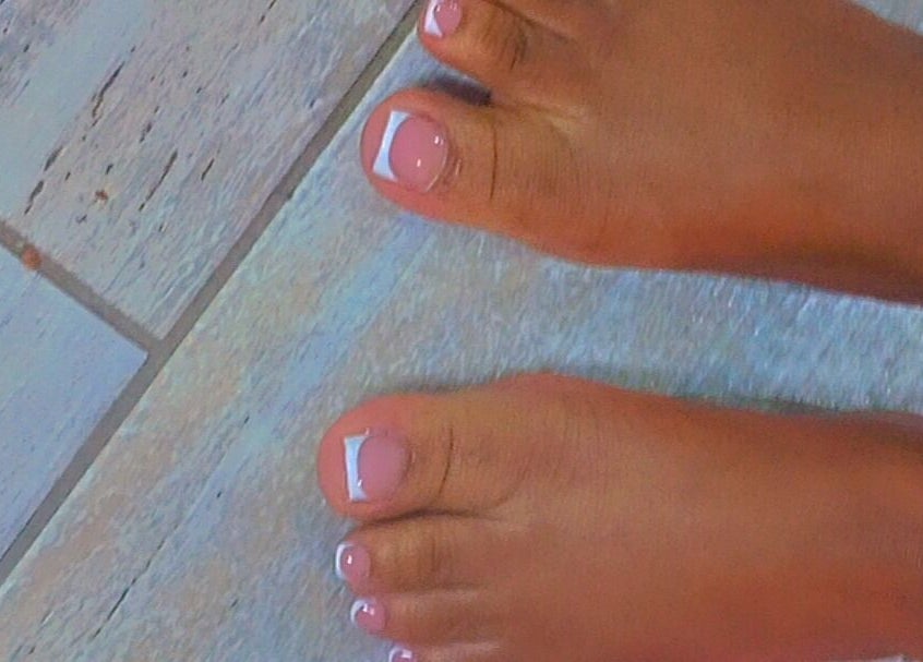 Elegant pedicure with French tips at Star Glam Nails, Sandton, Gauteng, ZA. Perfect relaxation and style.