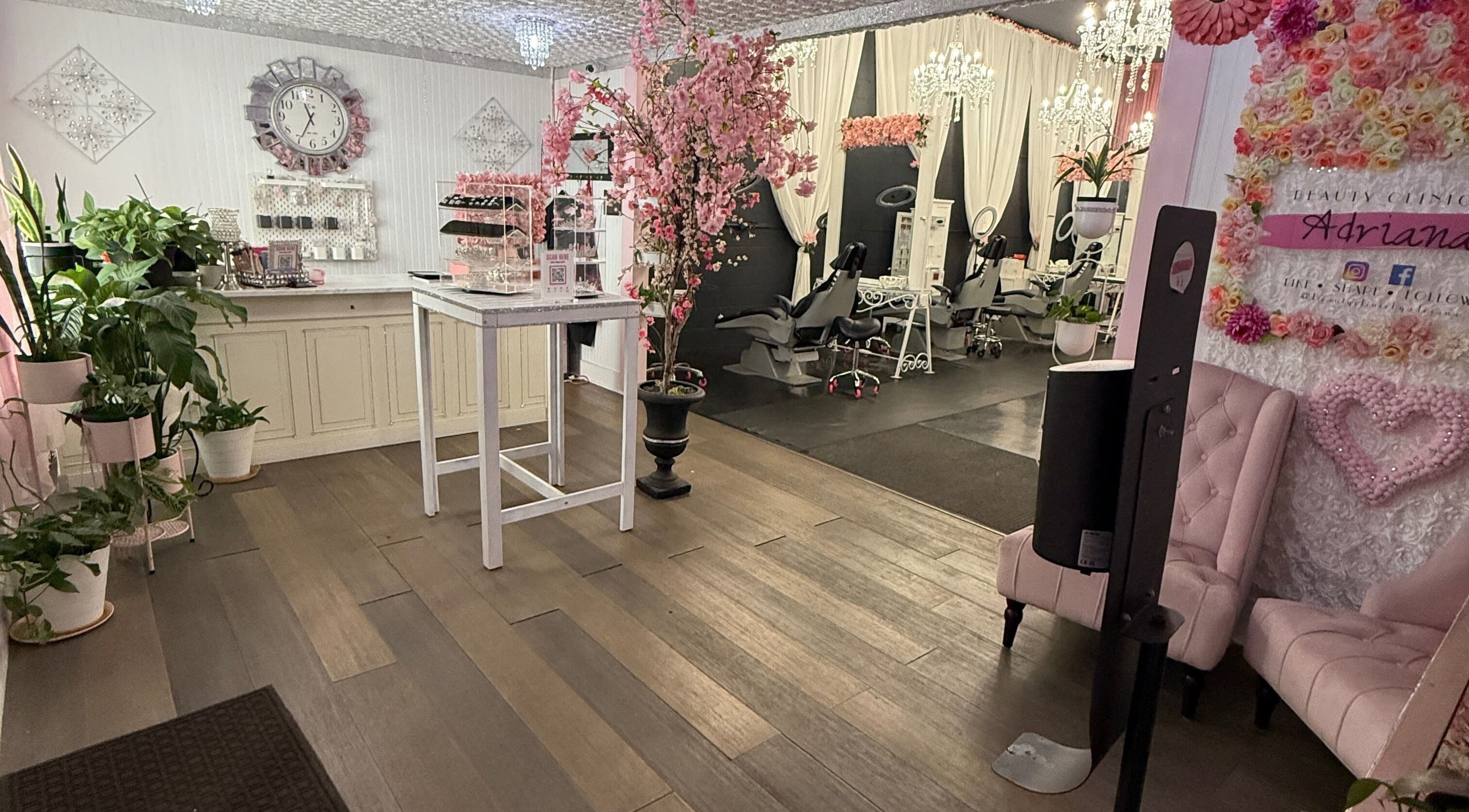 Interior of Beauty Clinic By Adriana in Perris, California, showcasing elegant decor and serene treatment chairs.