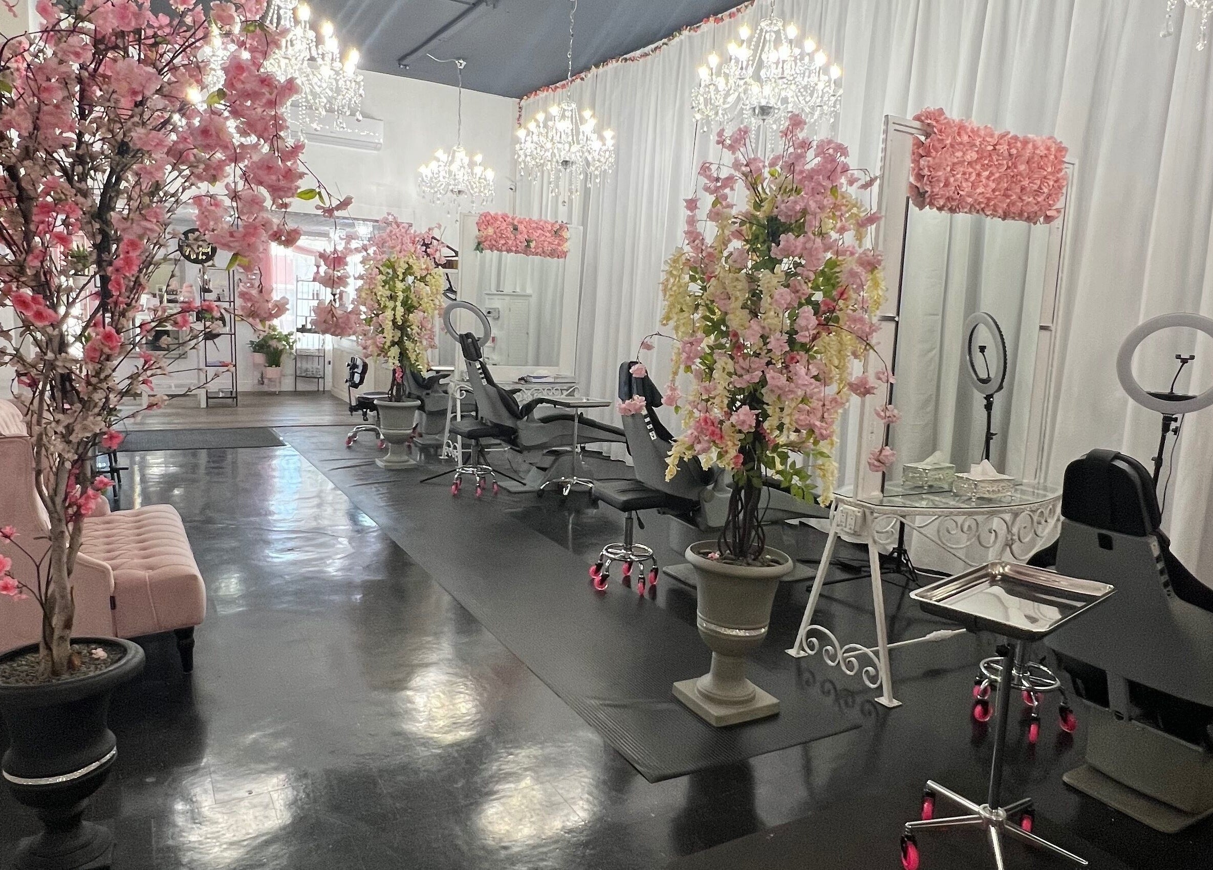 Chic interior of Beauty Clinic By Adriana, featuring pink floral decor in Perris, California, US.