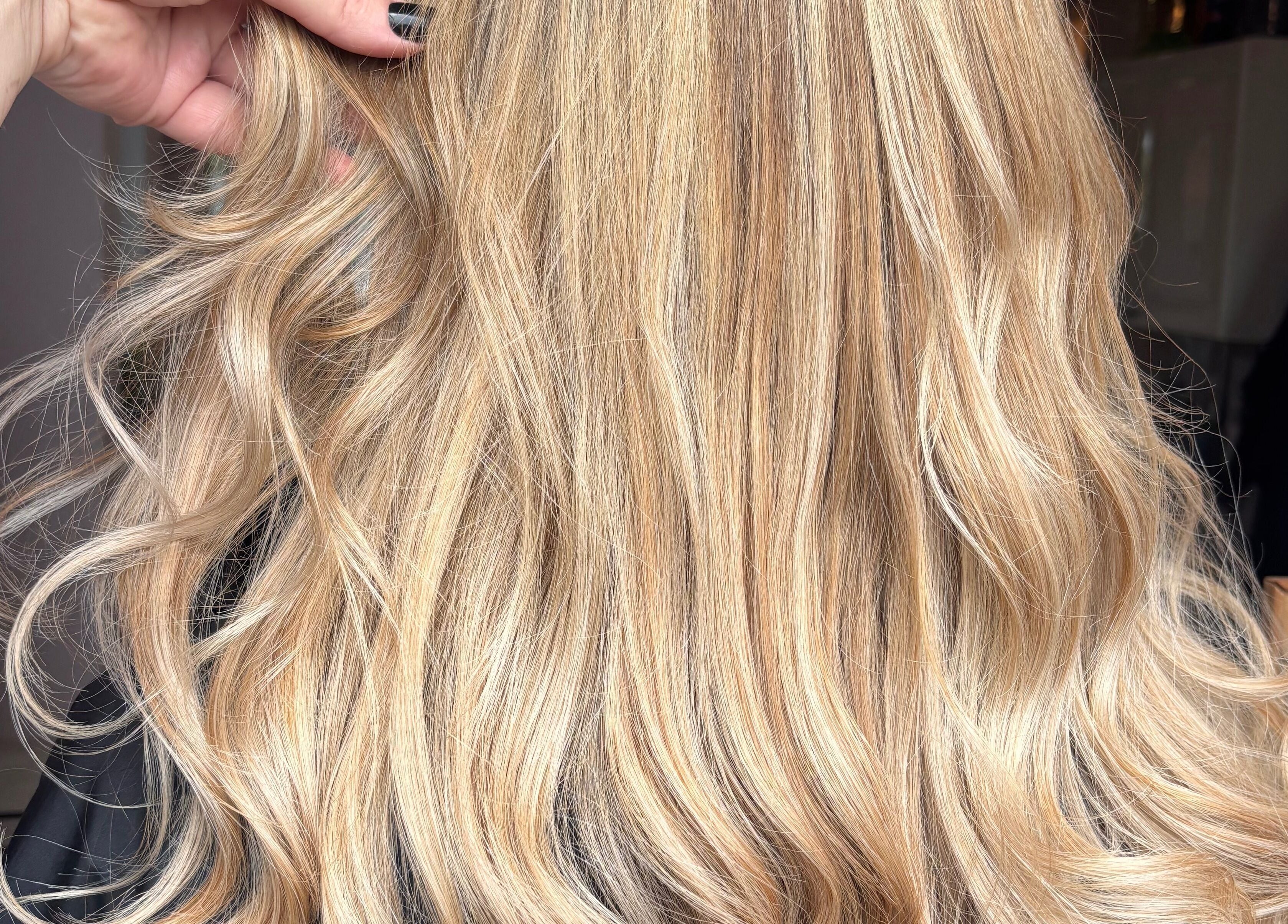 Radiant blonde waves styled at Trim N Tonic, Teignmouth, England, GB, showcasing expert hair design.