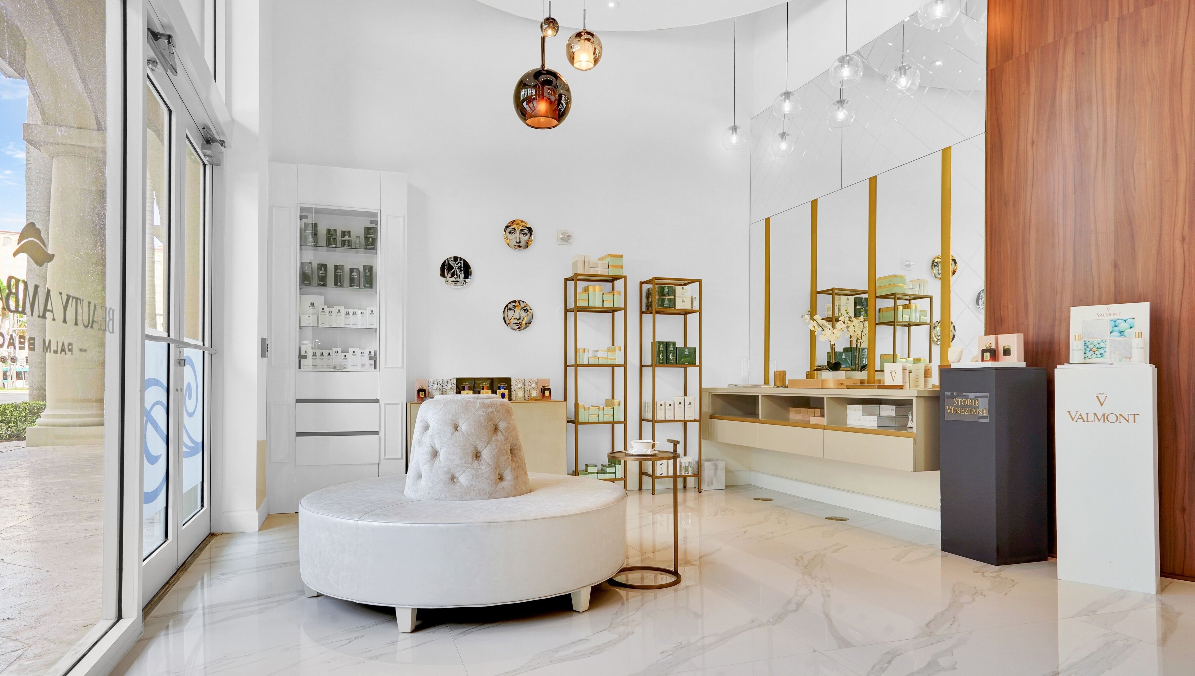Elegant interior of Beauty Ambassade and Spa in West Palm Beach, Florida, US with luxurious decor and seating.