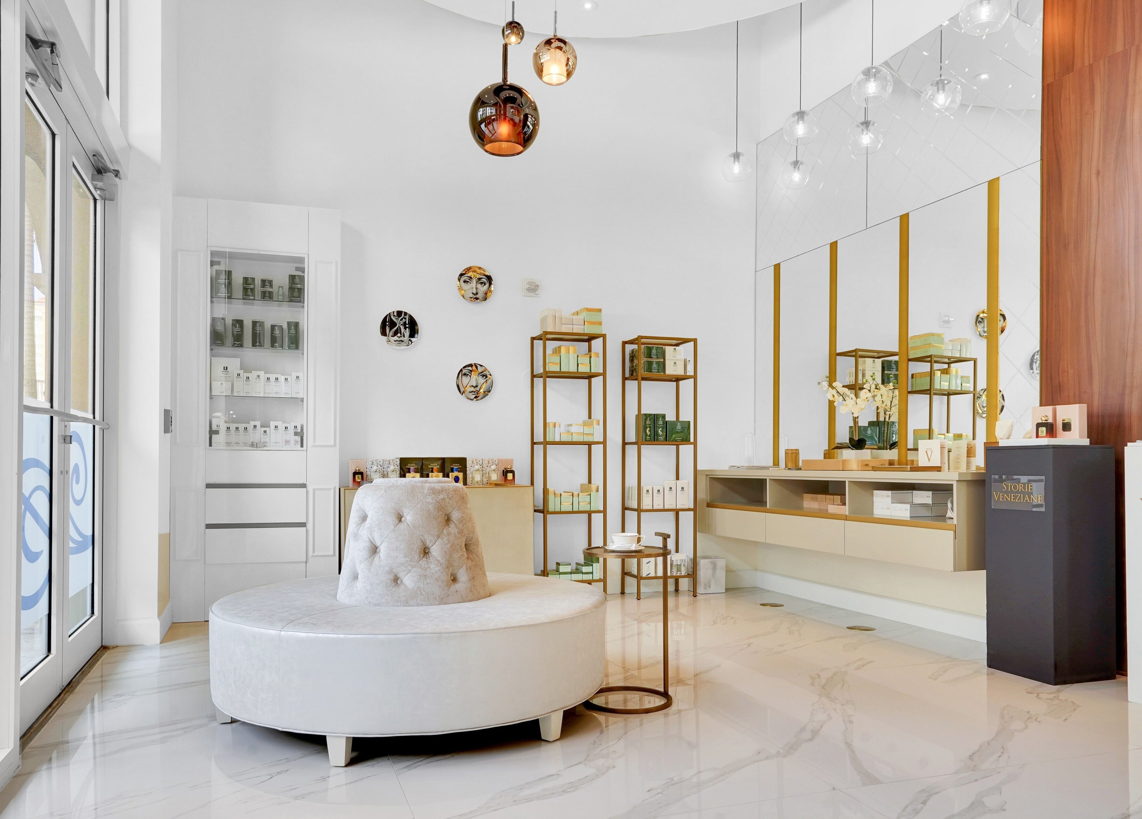 Elegant interior of Beauty Ambassade and Spa in West Palm Beach, Florida, US with luxurious decor and seating.