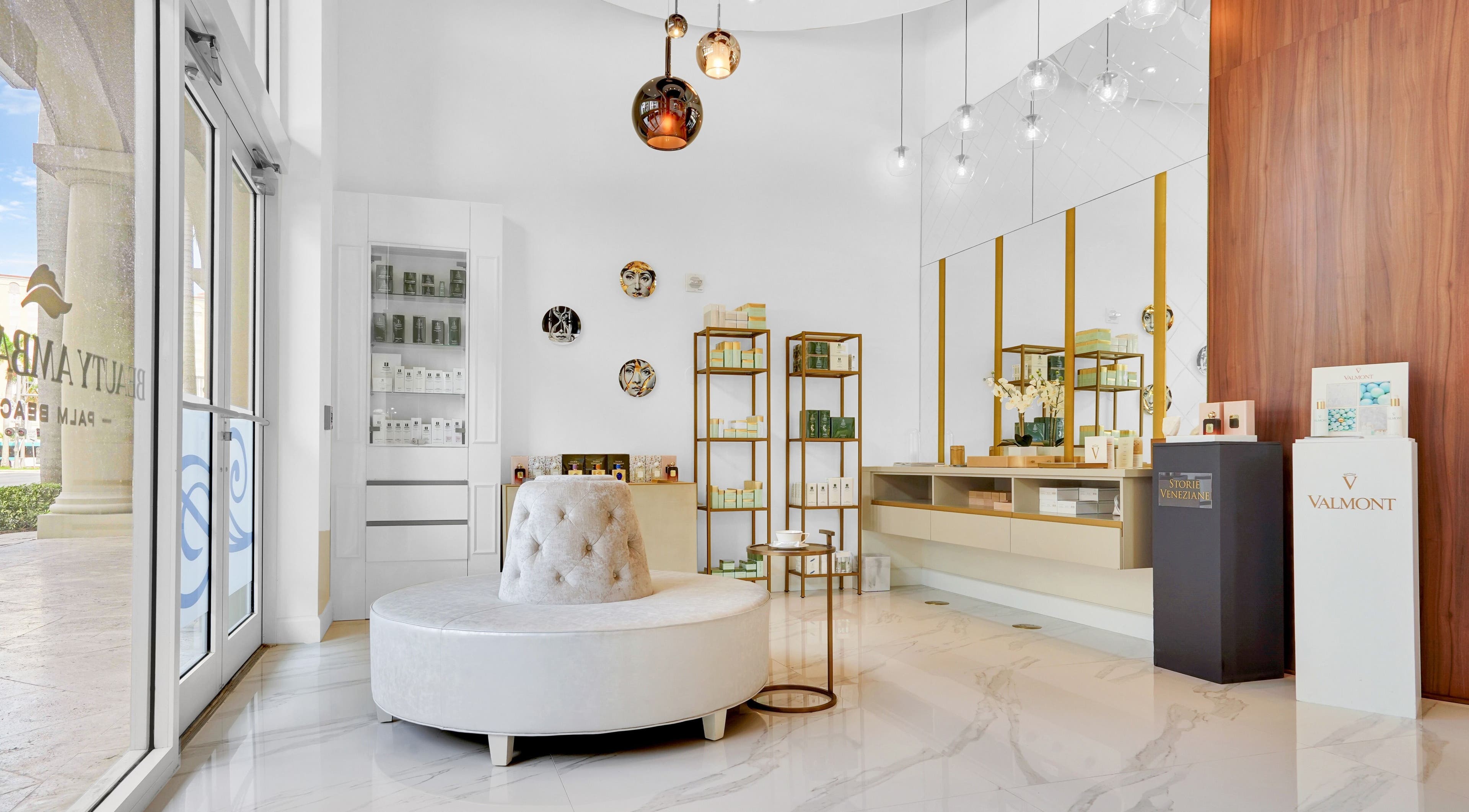 Elegant interior of Beauty Ambassade and Spa in West Palm Beach, Florida, US with luxurious decor and seating.