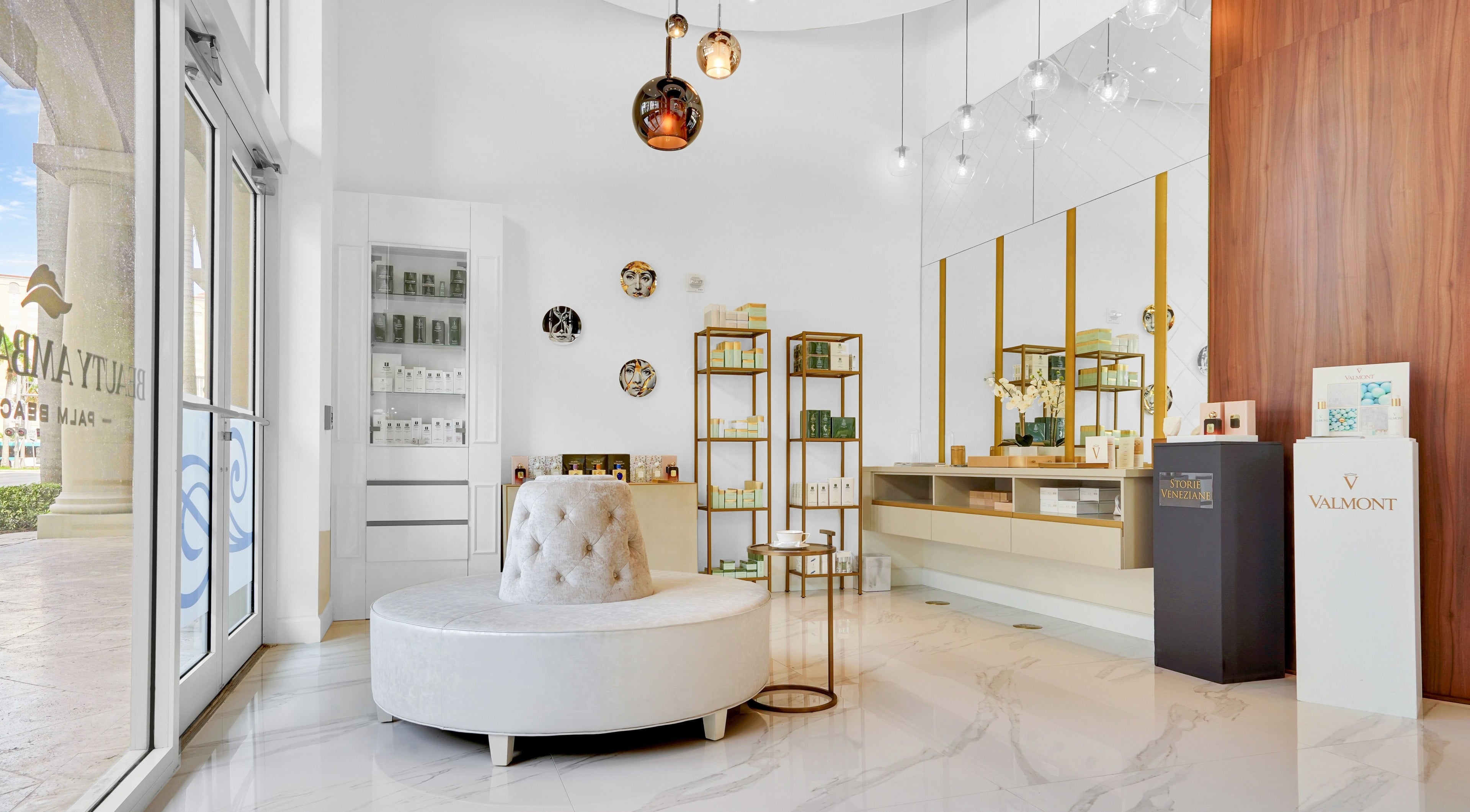 Elegant interior of Beauty Ambassade and Spa in West Palm Beach, Florida, US with luxurious decor and seating.