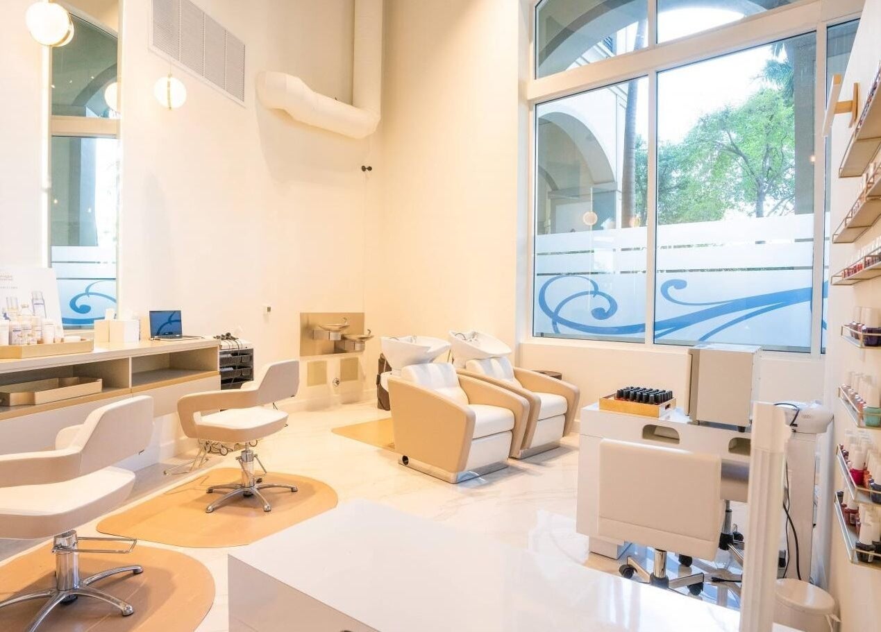 Chic salon interior at Beauty Ambassade and Spa in West Palm Beach, Florida, US with modern furnishings.