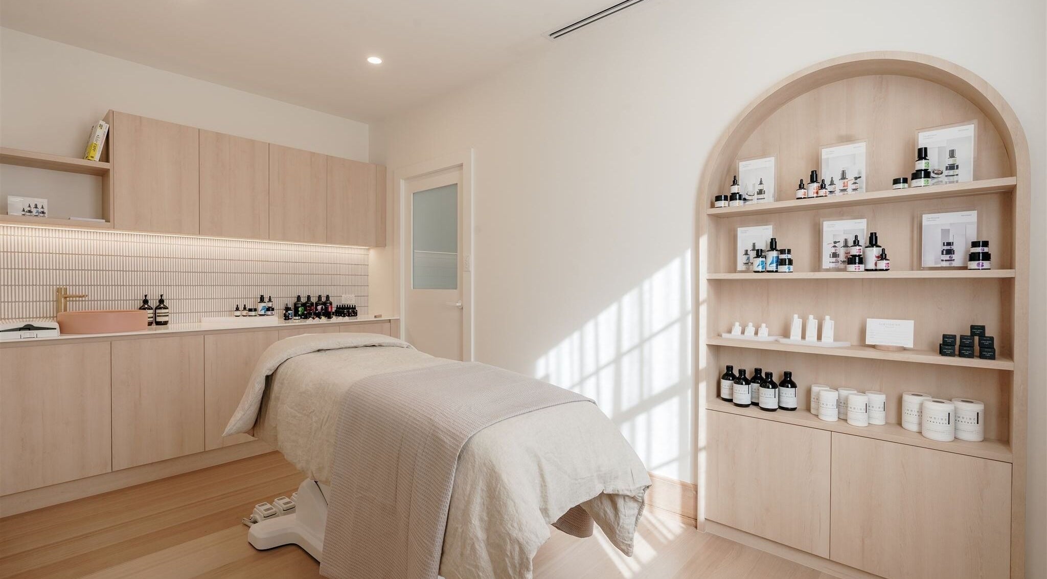 Elegant treatment room at Dr Daniel Tan and Associates, East Launceston, Tasmania, AU featuring a therapeutic bed.