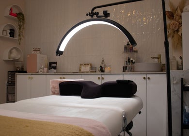 Reborn Lash Boutique's luxurious interior at Sanctuary Cove, Gold Coast, Queensland, AU featuring a lash bed.
